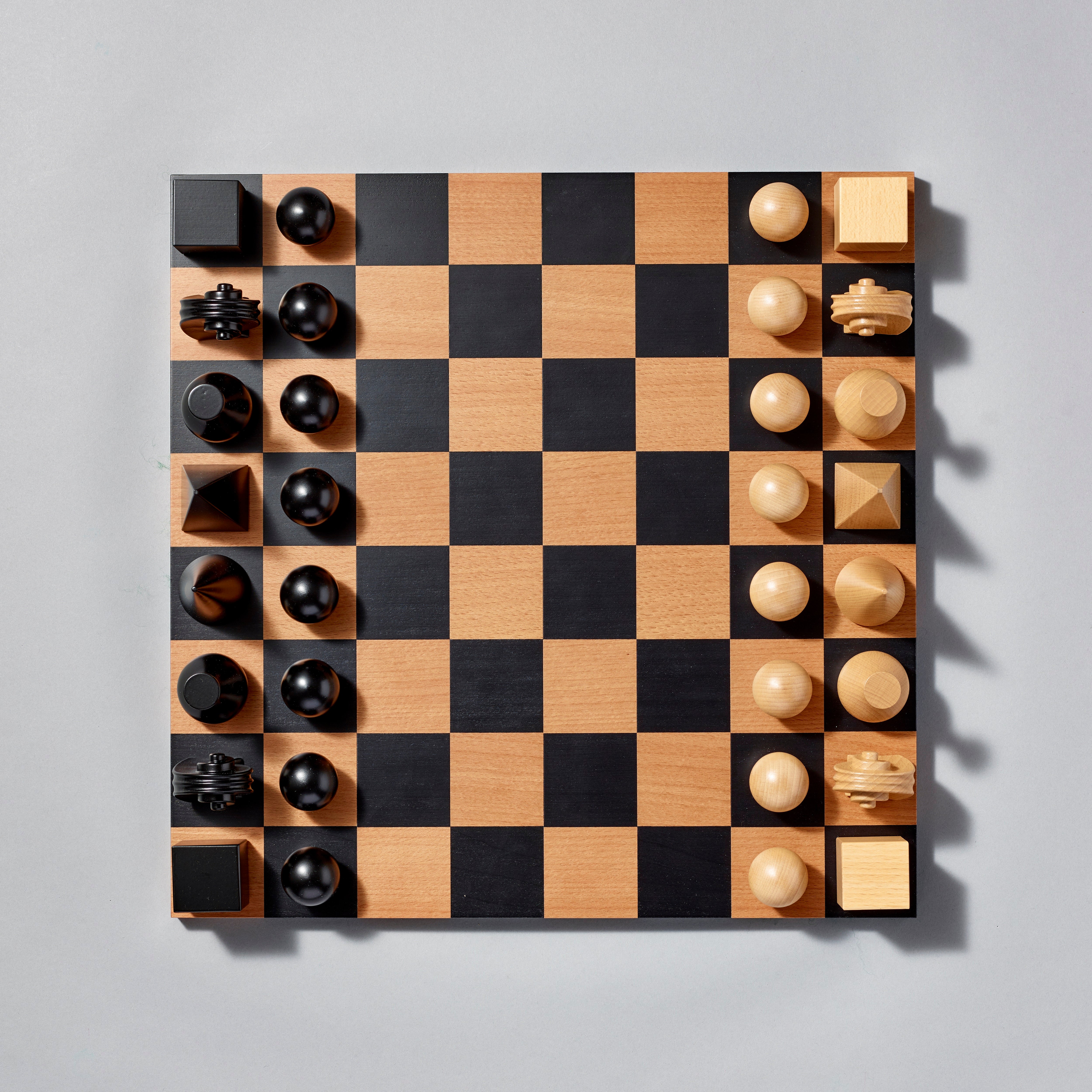Solid beech wood Man Ray Chess Set. Board size: 17" x 17" x 3/4".