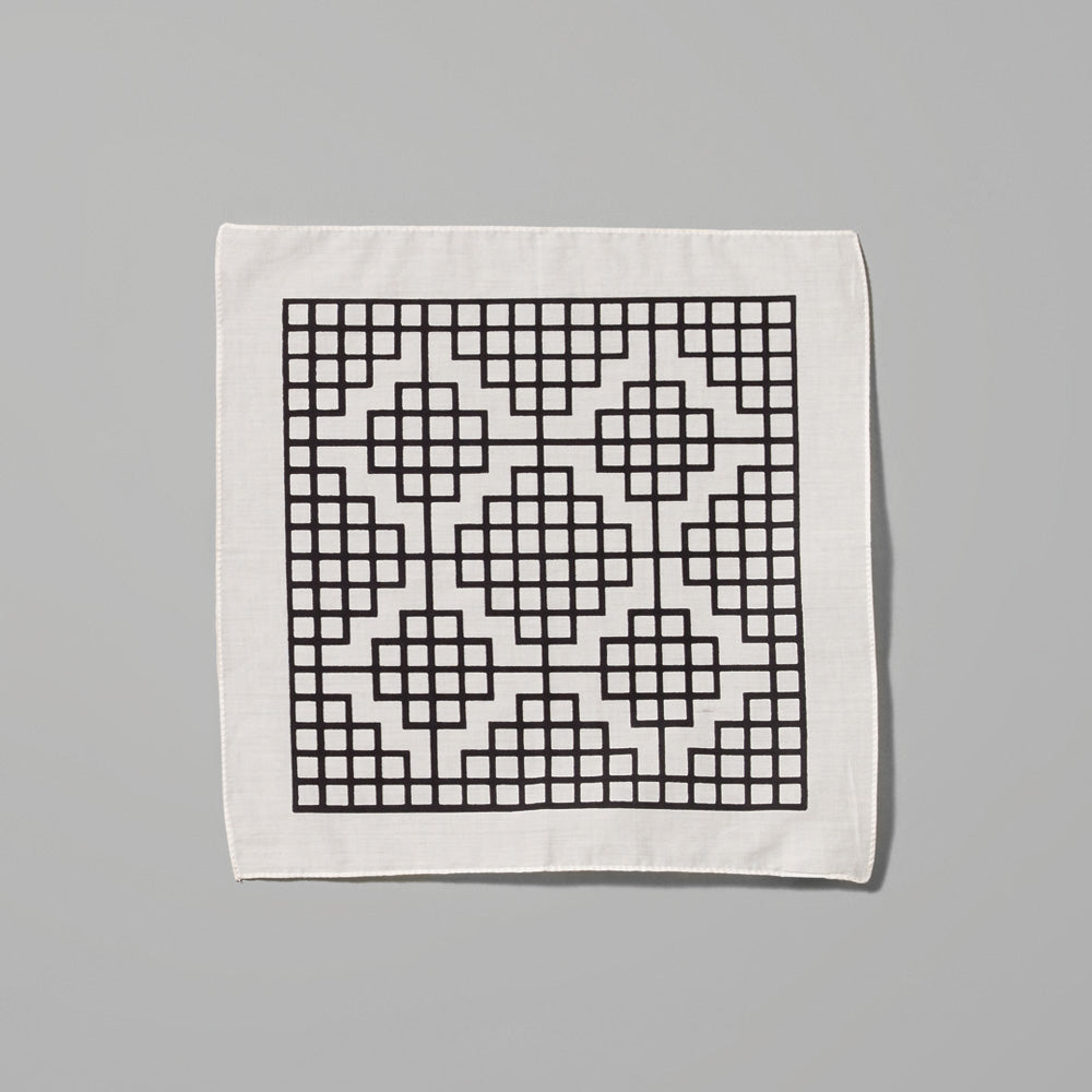 100% cotton Carol Bove Grid white handkerchief with black grid design. Measures 9.84" x 9.84".