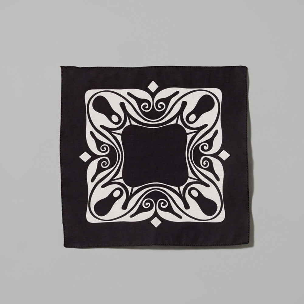100% cotton Carol Bove Origin black handkerchief with white design. Measures 9.84" x 9.84".