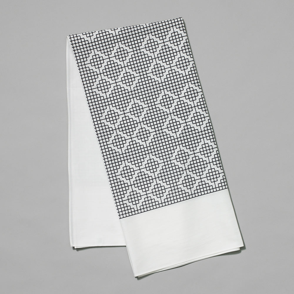 65% tencel, 35% cotton grid scarf by Carol Bove. Measures 40" x 40".