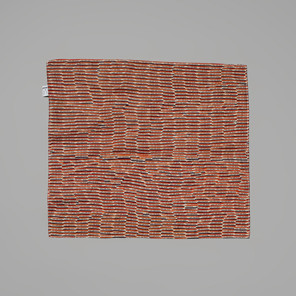 100% lawn cotton handkerchief featuring Yayoi Kusama's Air Mail Stickers. Measures 15.75" x 15.75".