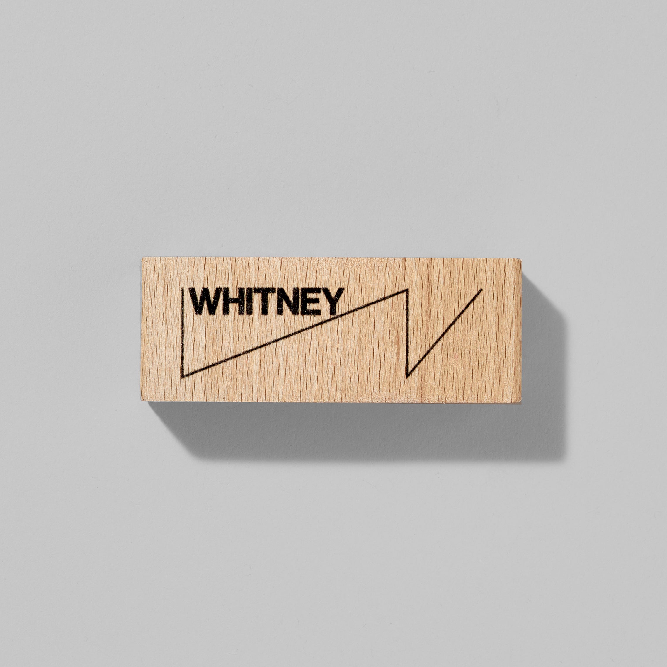 5 hole Whitney wooden sharpener. Measures 2.75" x 1" x 0.75"