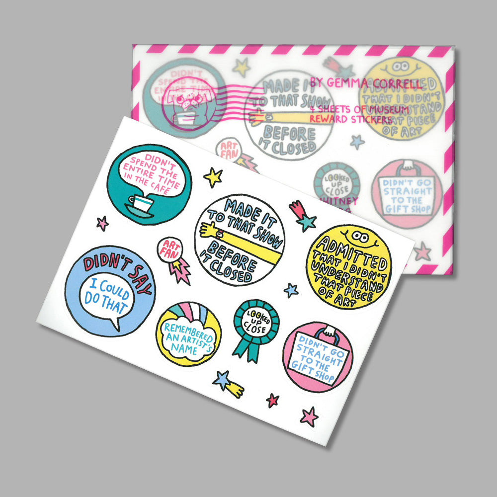 Sheet of colorful stickers with text and graphics on a gray background