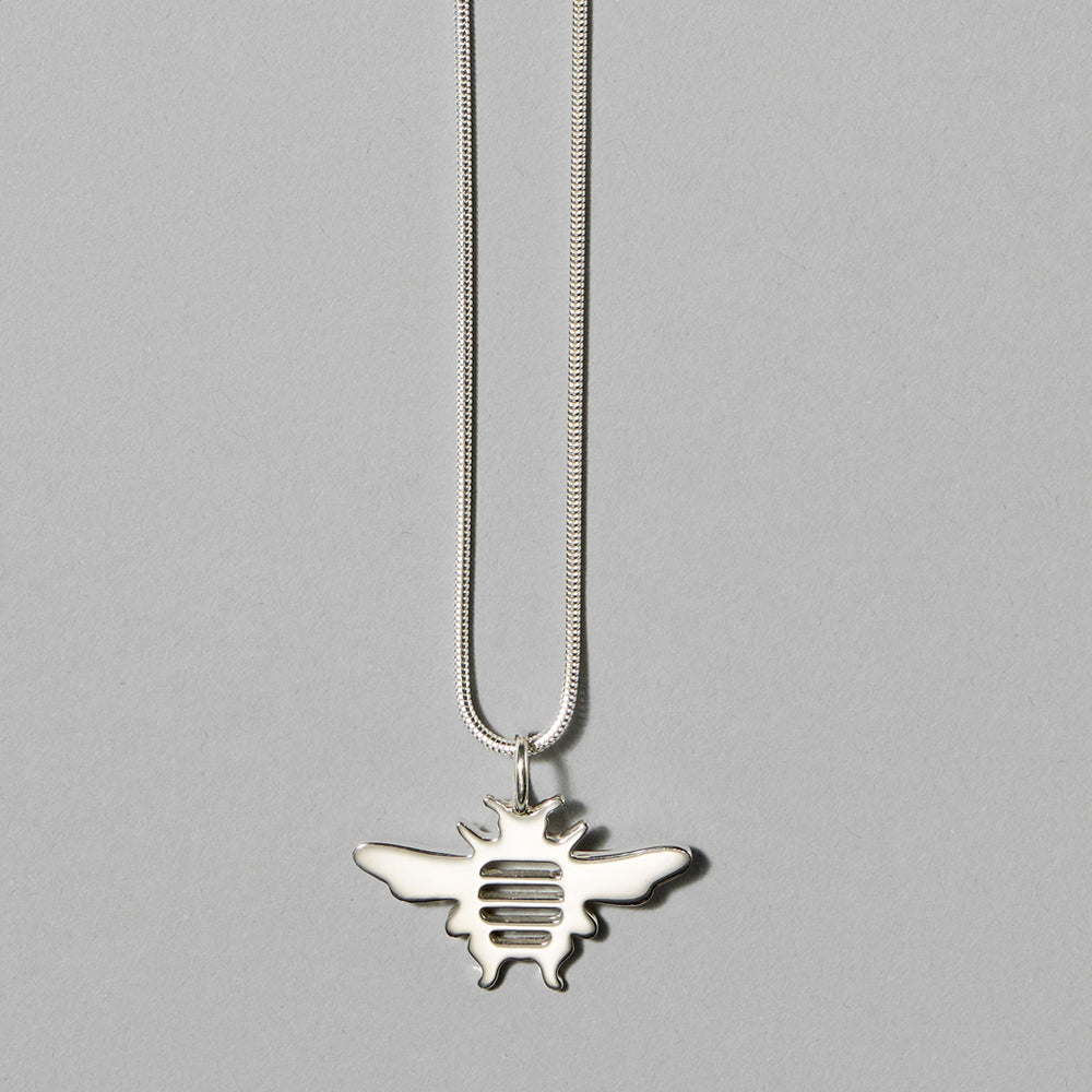 Sterling silver bee necklace by Michele Benjamin. Measures 1 3/8"x 1 ¾"x 5/8".
