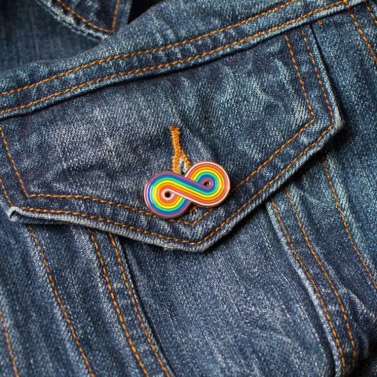 1.25" Hard enamel "Forever Gay" pin on denim jacket