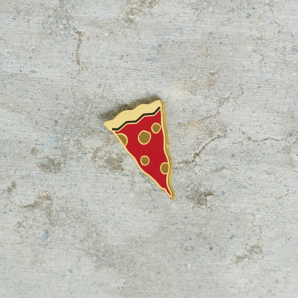 Pizza hard enamel and metal pin illustrated by Tamara Shopsin.