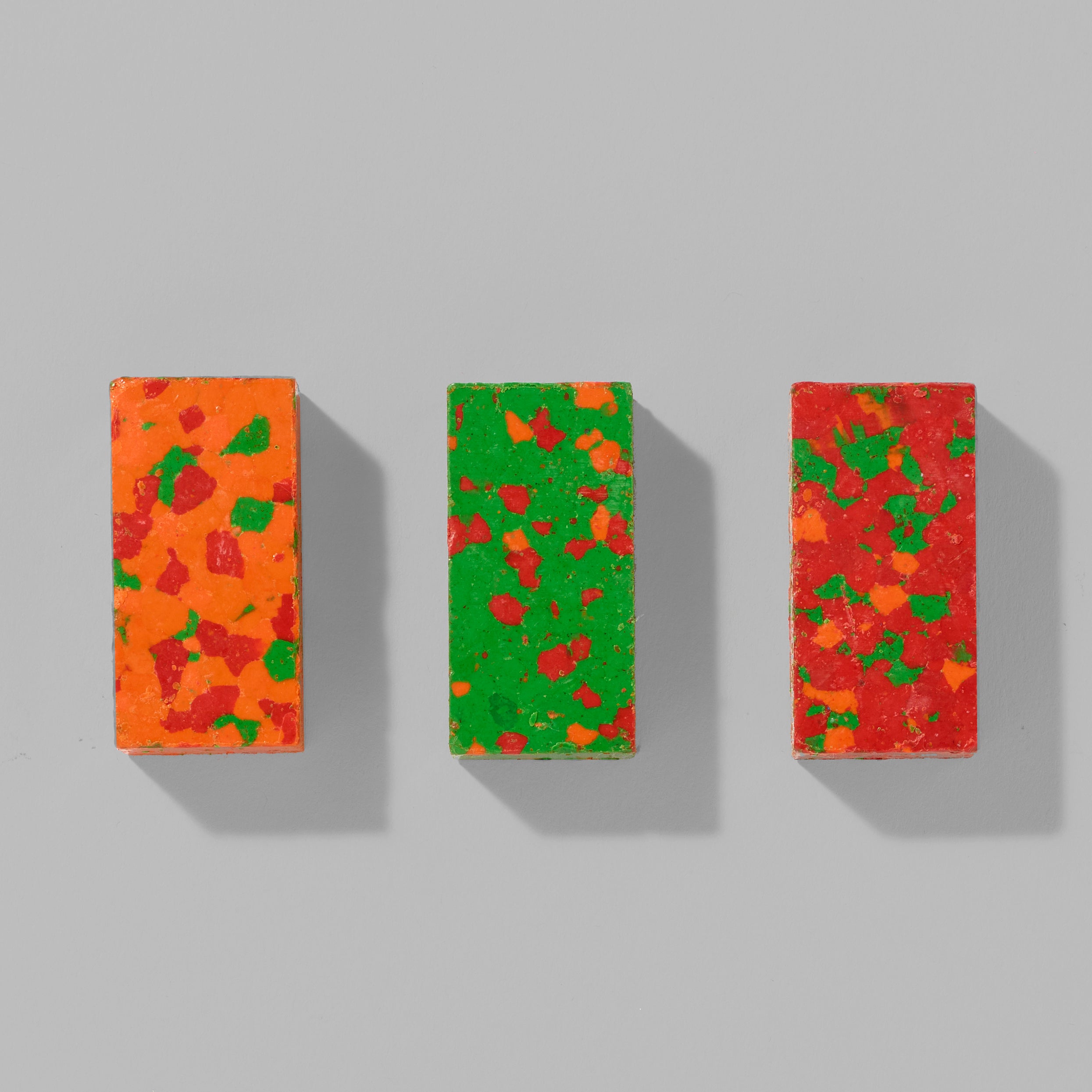 Set of 3 Biennial Crayons each measuring 1.5" x 1" in orange, green, and red