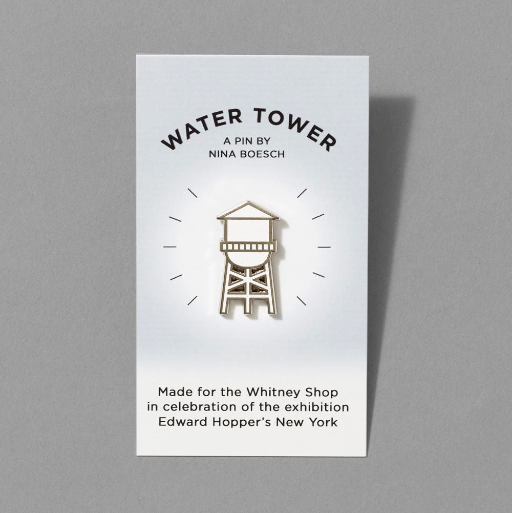 Water tower hard enamel pin by collagist Nina Boesch.
