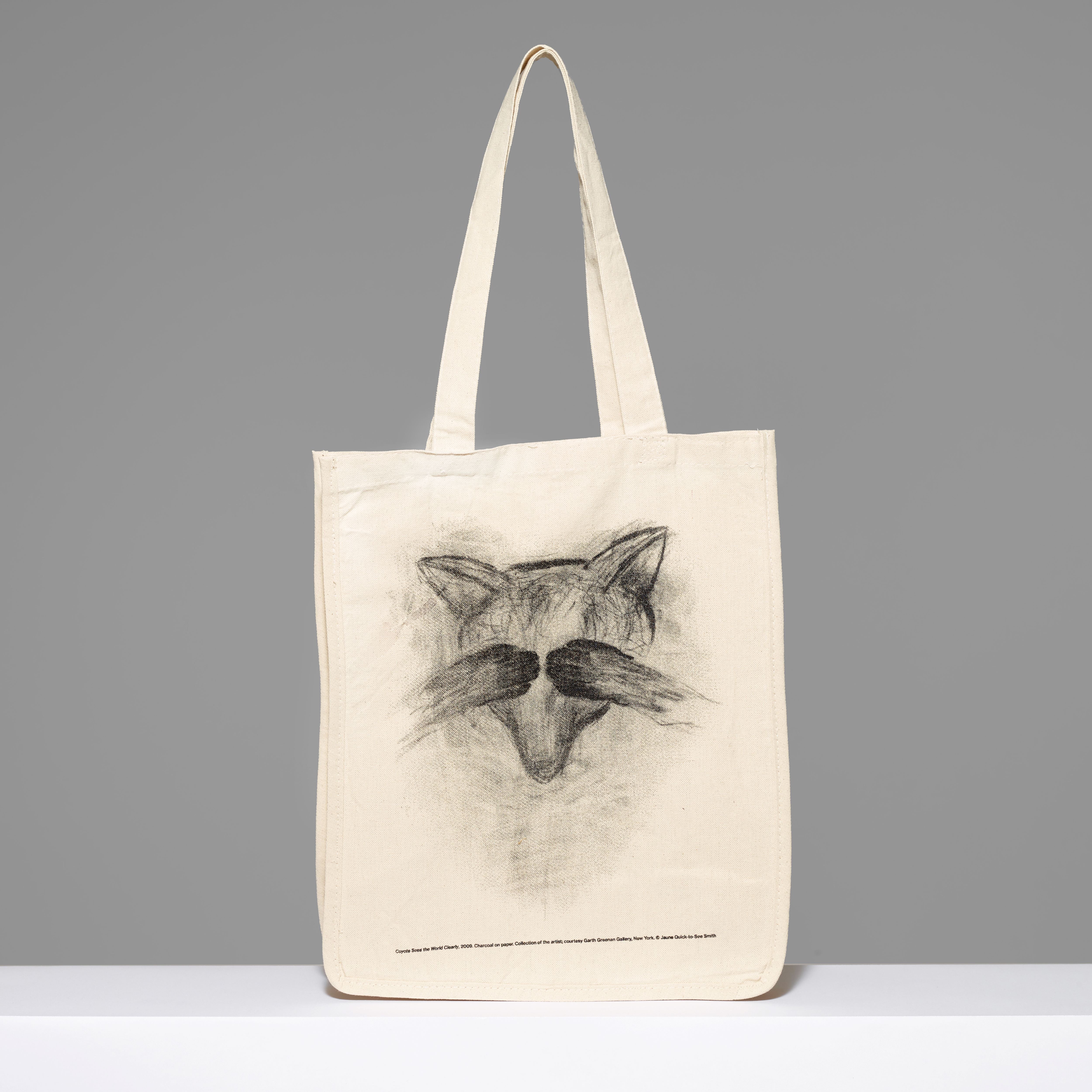 100% cotton canvas tote featuring Jaune Quick-to-See Smith Coyote See the World Clearly. Measures 17" H x 14" L x 7" W