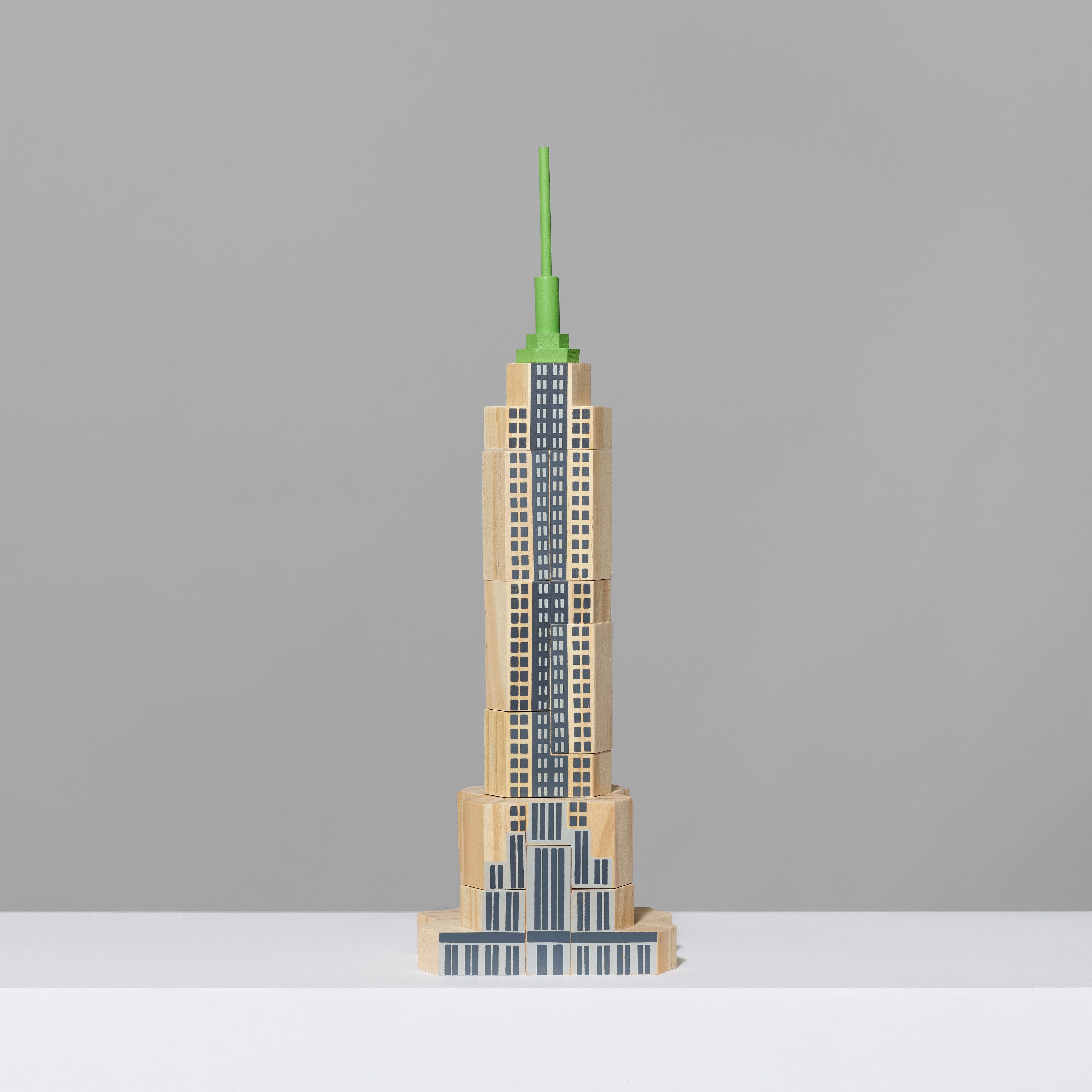 New Zealand pine building blocks assembled into a skyscraper