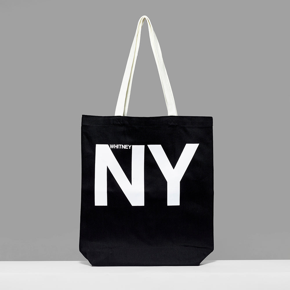 100% cotton black tote with white handles and Whitney NY screen printed in the center. Measures 13.5" x 13.75". 3.5" gusset, 12" handles.