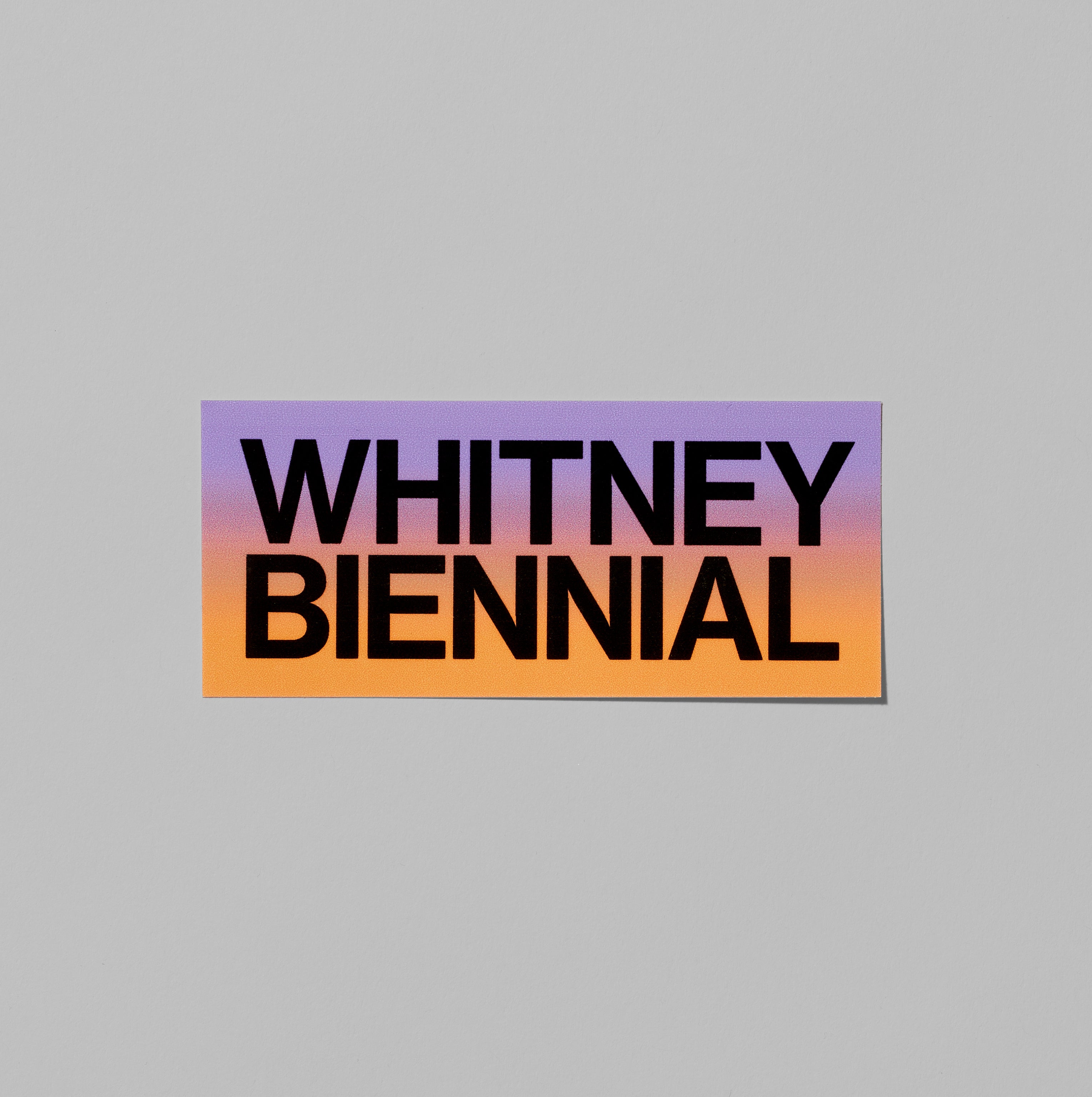 Purple and orange Whitney Biennial sticker