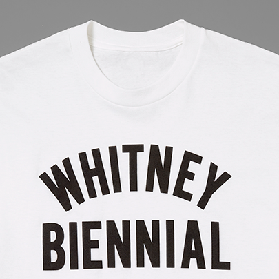 White t-shirt with 'WHITNEY BIENNIAL' text on a gray background