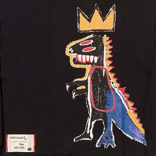 Black sweatshirt with colorful graphic design on a gray background