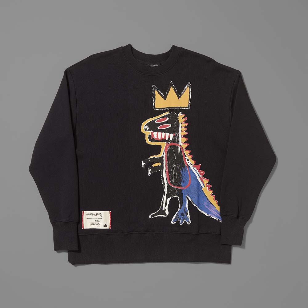 Black sweatshirt with colorful graphic design on a gray background