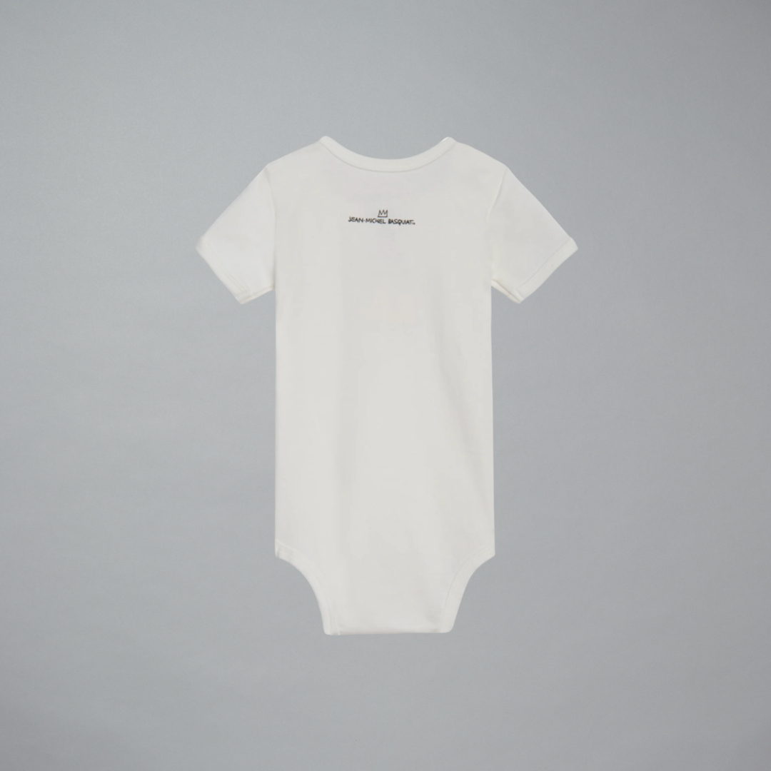 A white short-sleeve baby onesie with a small black logo on the back, displayed flat against a solid gray background.