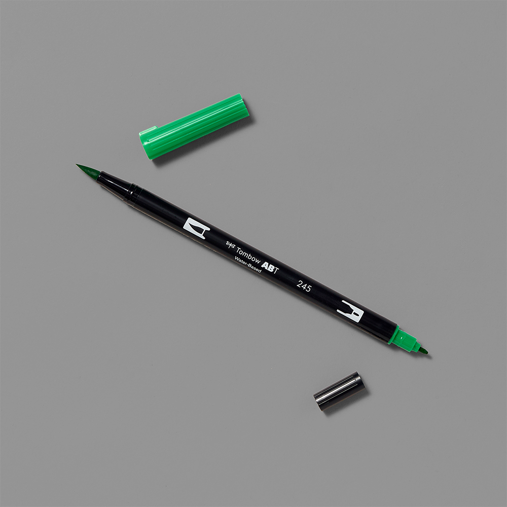 Dual brush pen with both caps removed