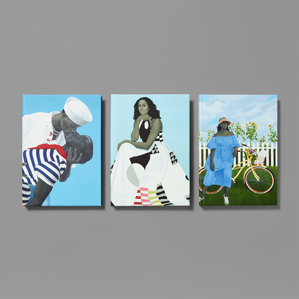 A selection of three journals featuring works by Amy Sherald