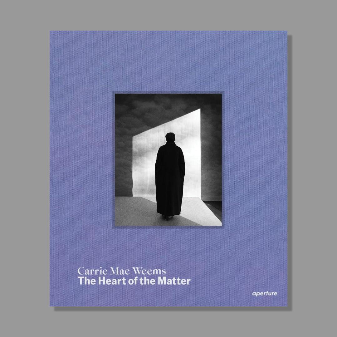 Book cover of 'The Heart of the Matter' by Carrie Mae Weems with a silhouette of a person in a doorway.