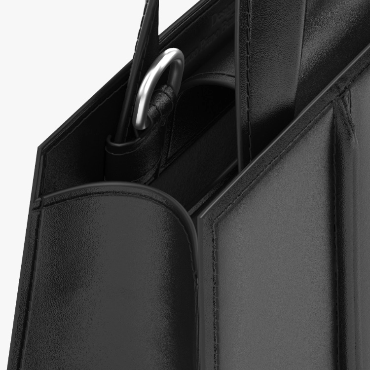 Close-up of a black leather bag on a white background