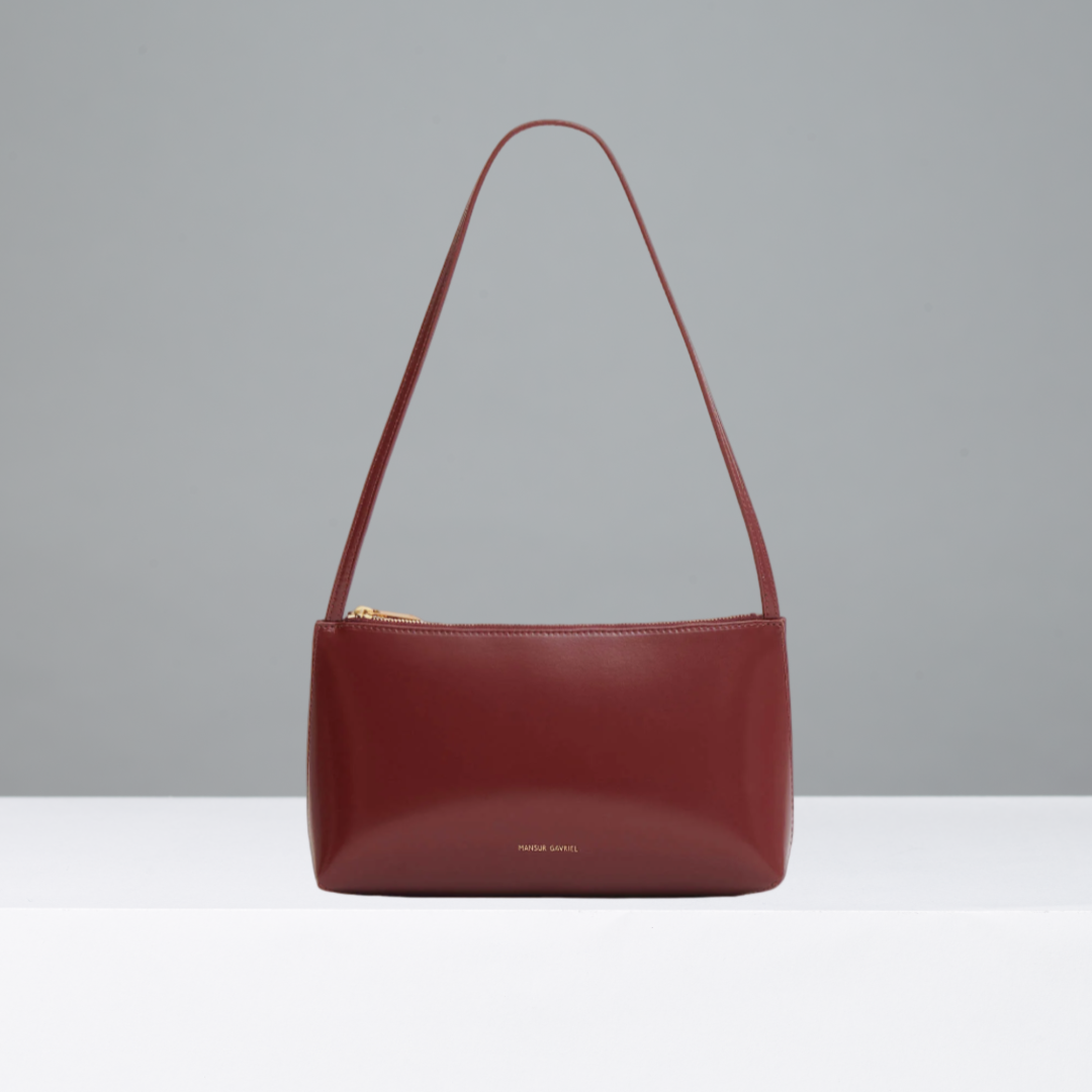 Red handbag on a gray background
