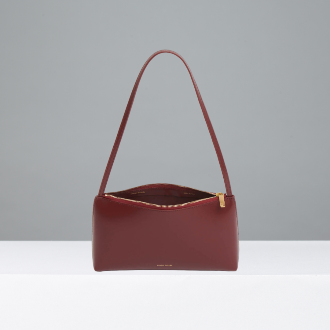 Claret shoulder bag on a light gray background