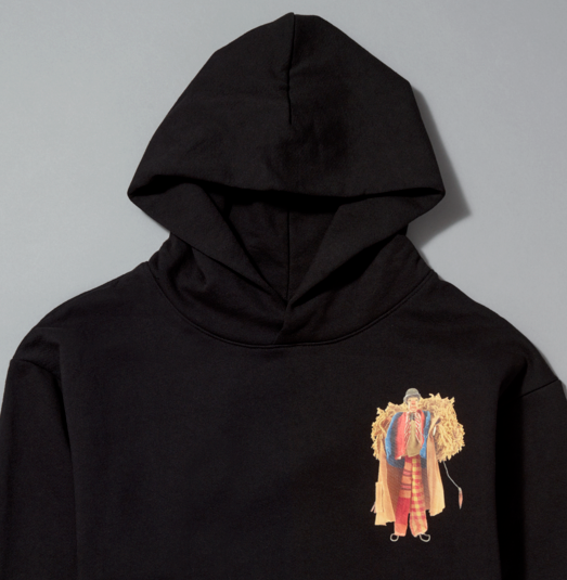 Black hoodie with a colorful graphic on a gray background