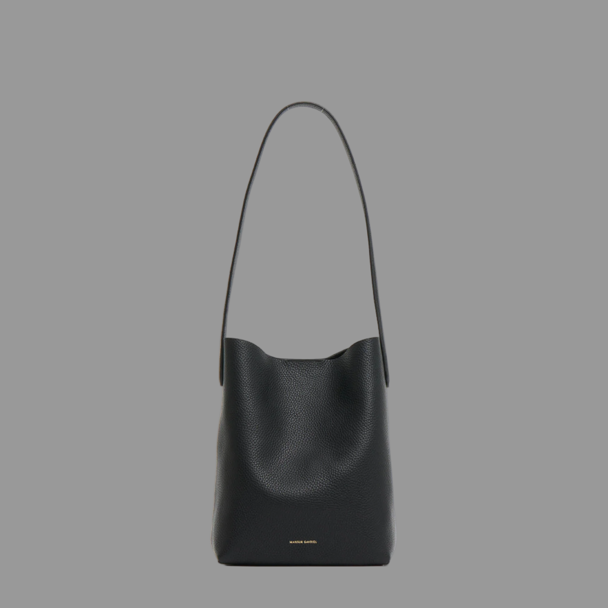 Black leather handbag on a light gray background