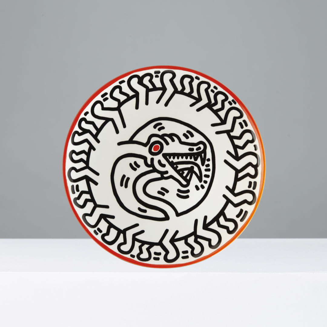 Circular design with a snake and red circle on a gray background