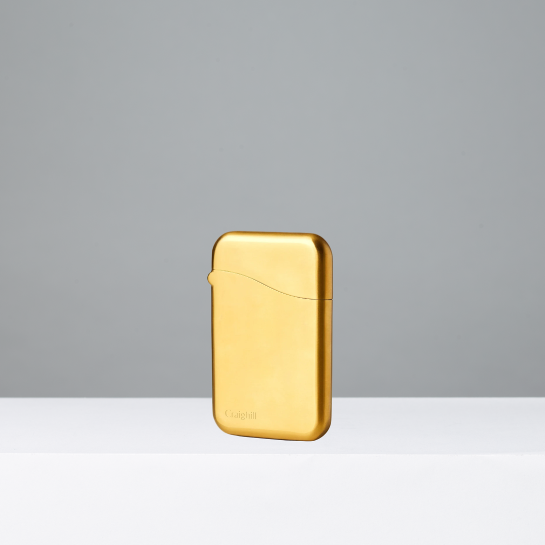Vapor Brass Summit Card Case on a gray background