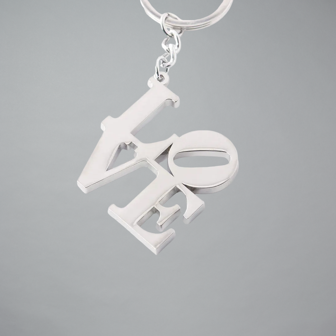 Silver keychain featuring LOVE by Robert Indiana