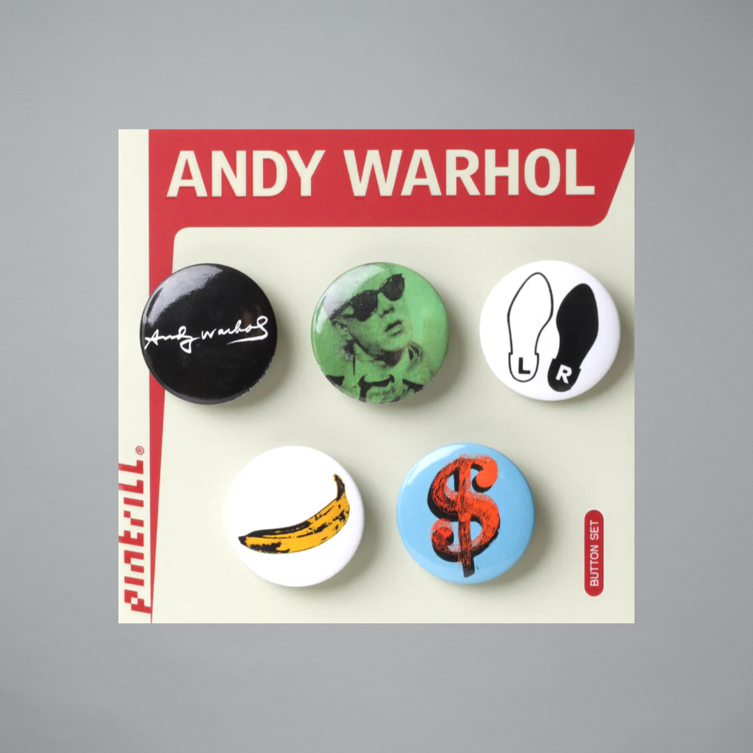 Set of five metal pins featuring works by Andy Warhol