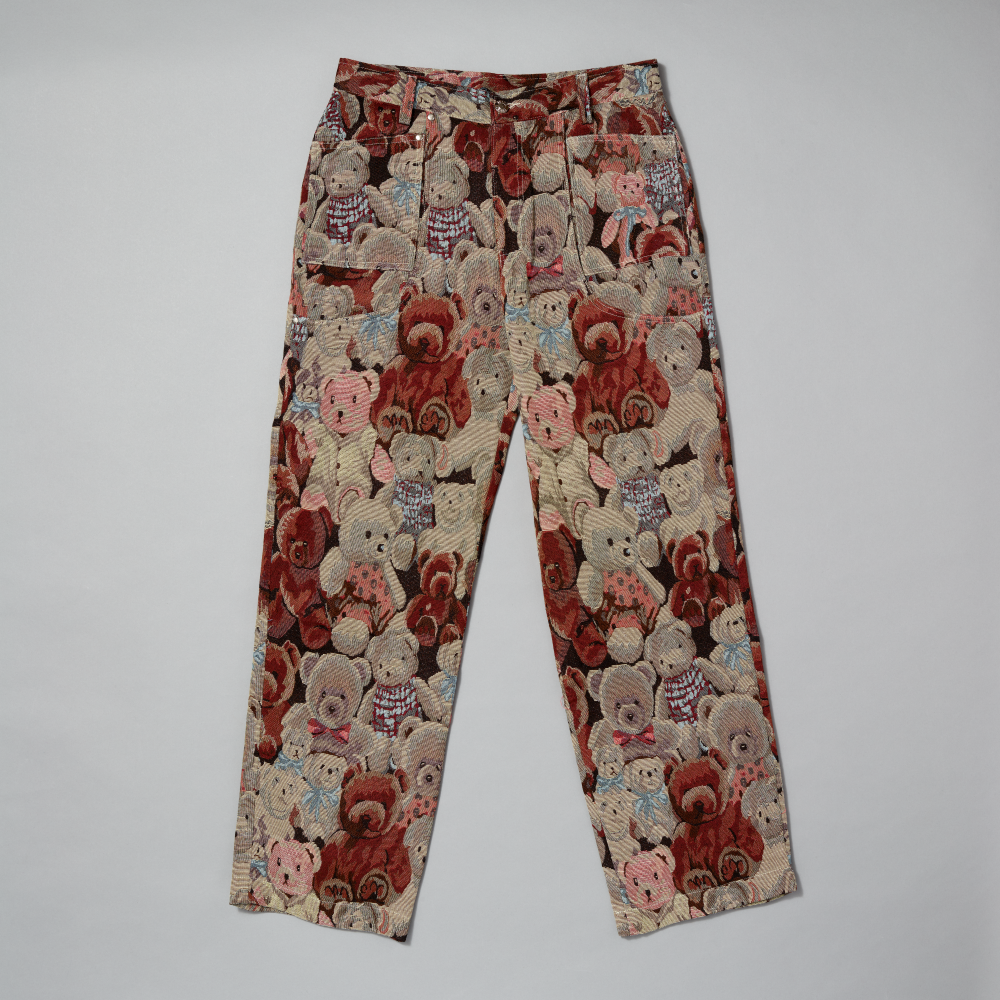 Trousers with teddy bear pattern on a gray background