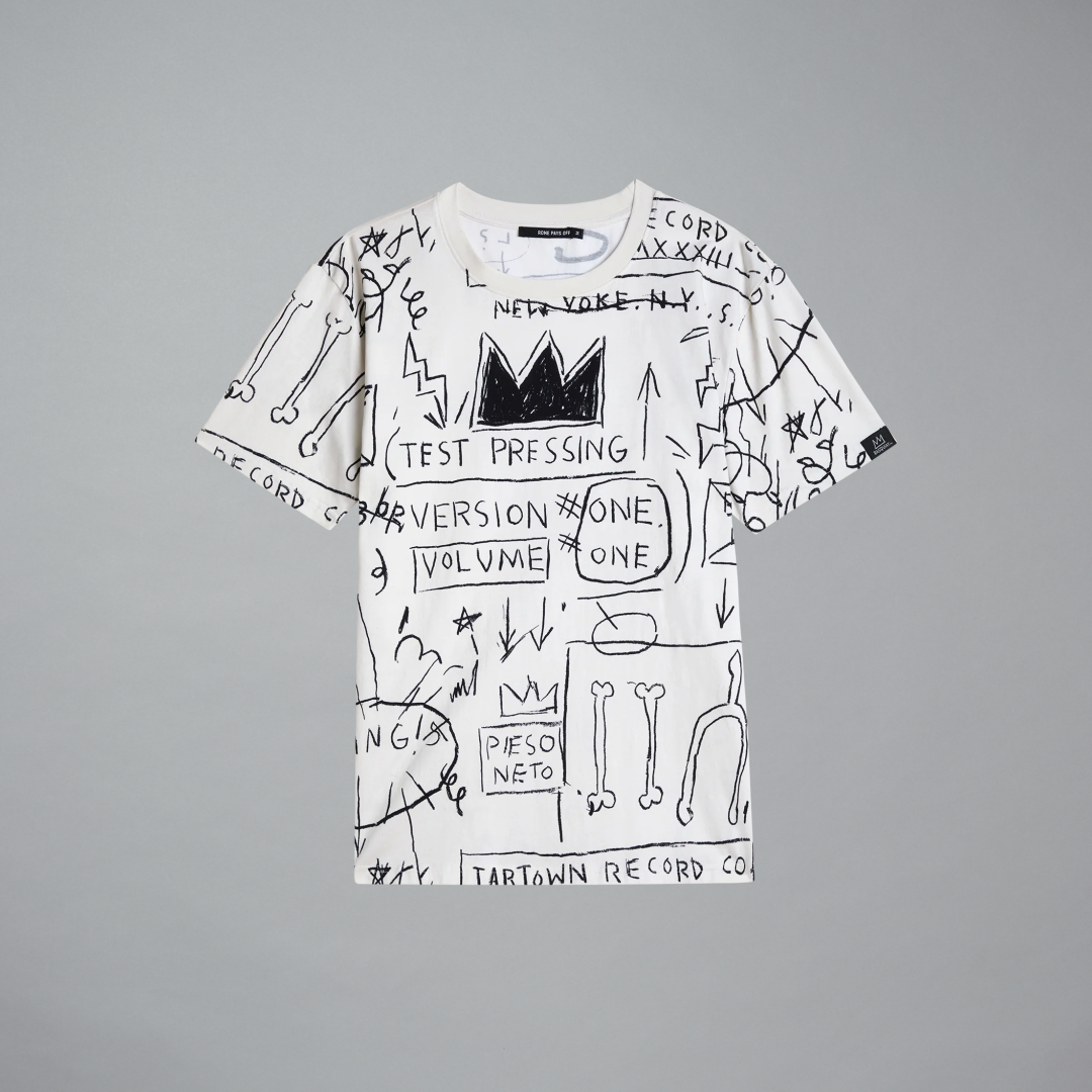 A white short-sleeve graphic t-shirt with Jean-Michel Basquiat's Beat Bop artwork shown flat against a neutral gray background.