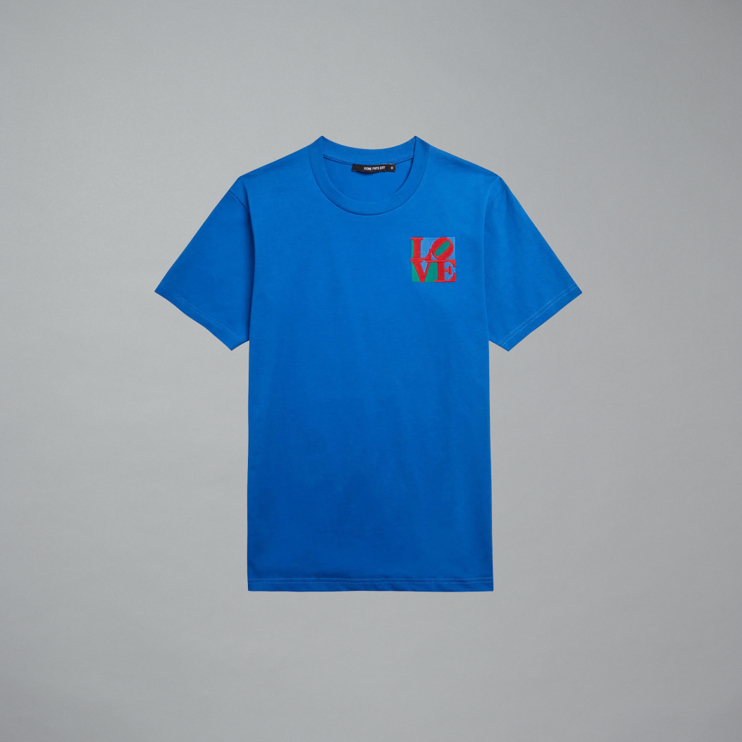 Blue t-shirt with Robert Indiana's LOVE artwork on a gray background