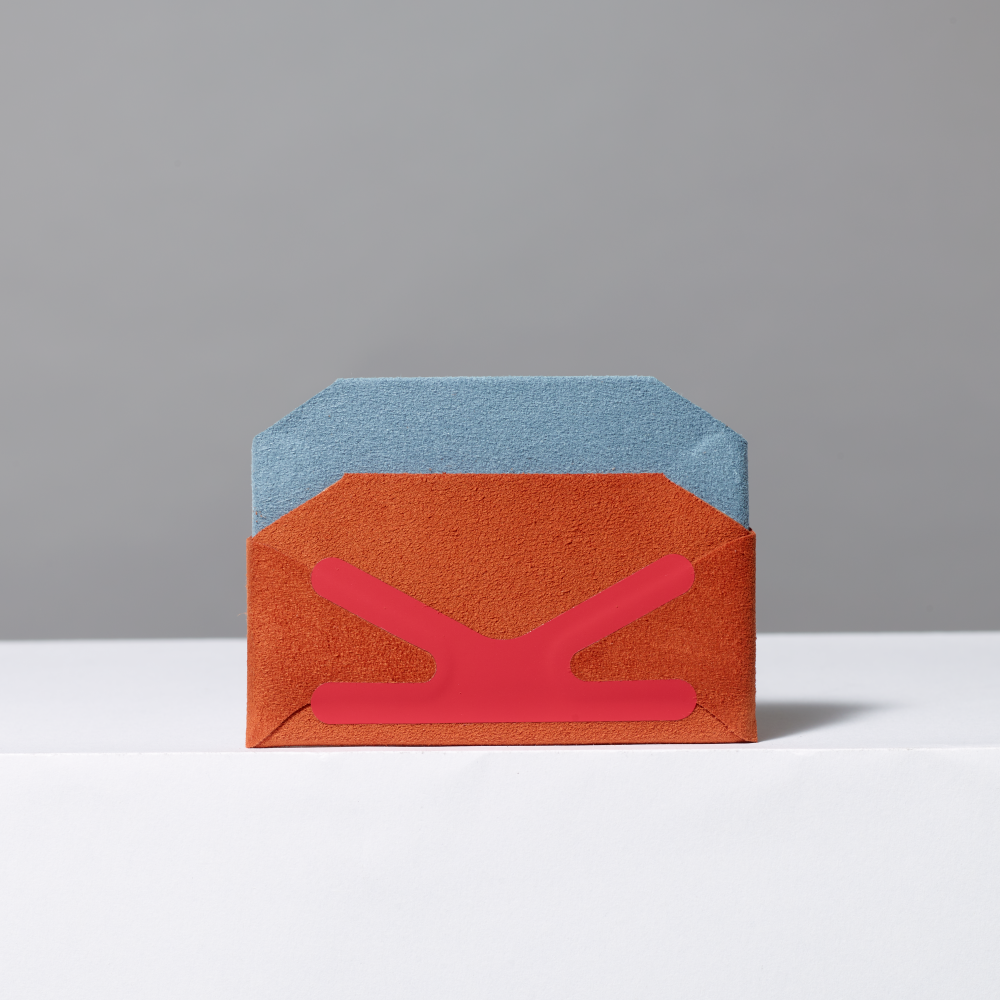 Two-toned card wallet with blue top and orange bottom, featuring the brand 'Craighill'.