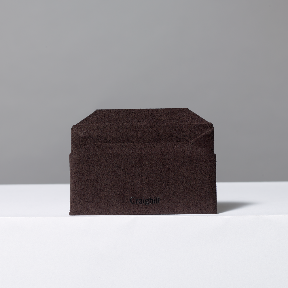 Card wallet of coffee brown ultrasuede, featuring the brand 'Craighill'.