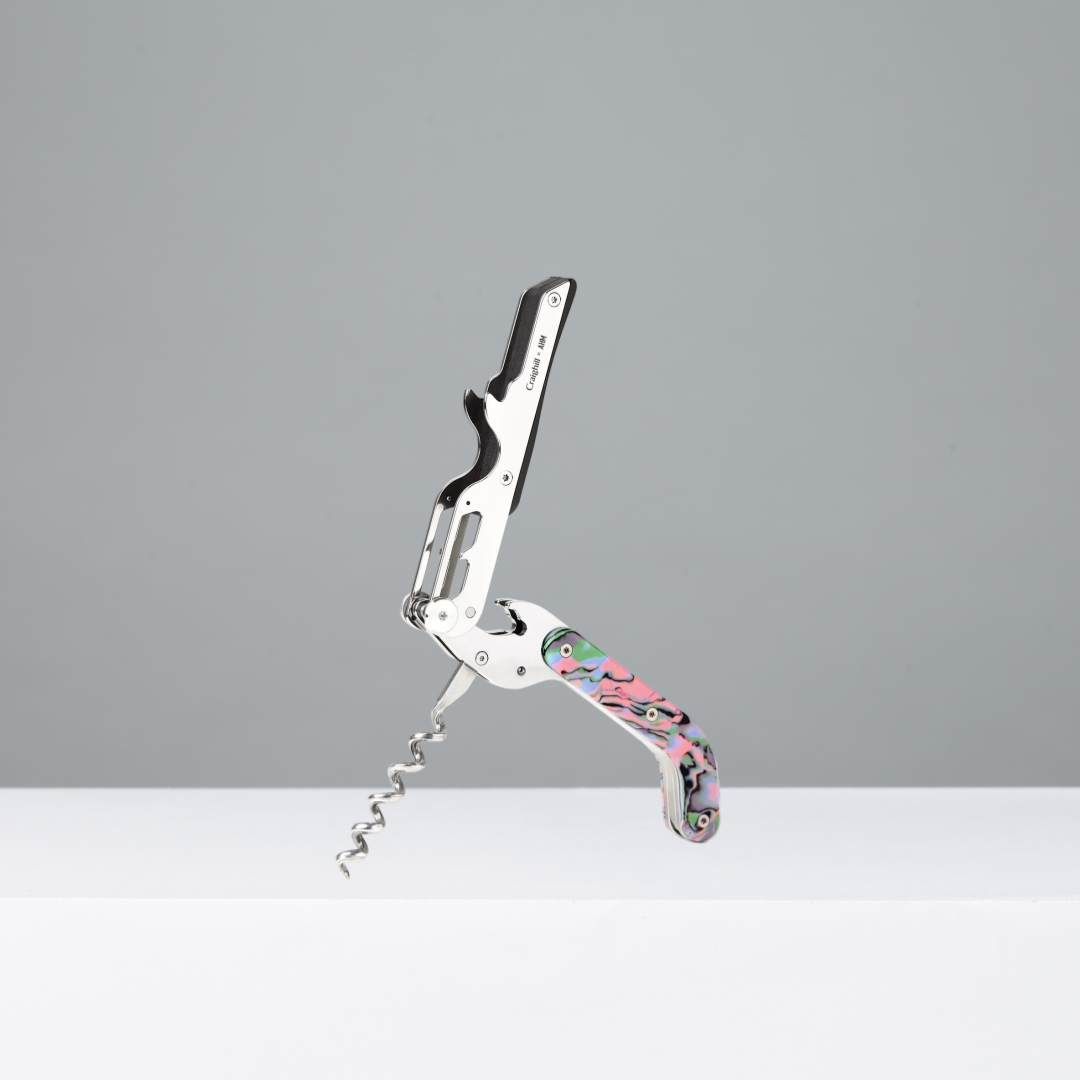 Corkscrew with amalgam handle on a gray background