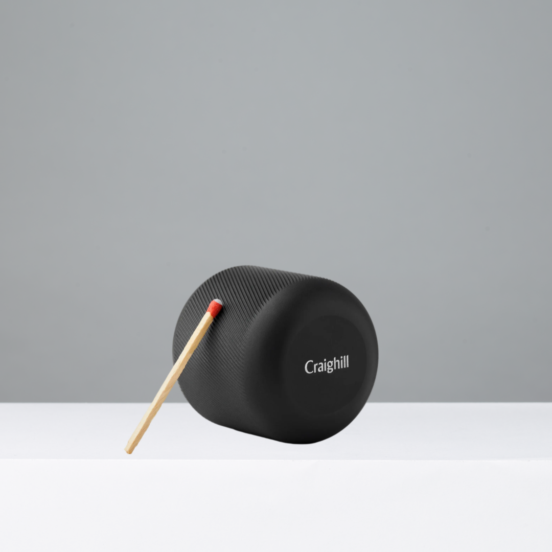Black Match Striker with match on a gray background