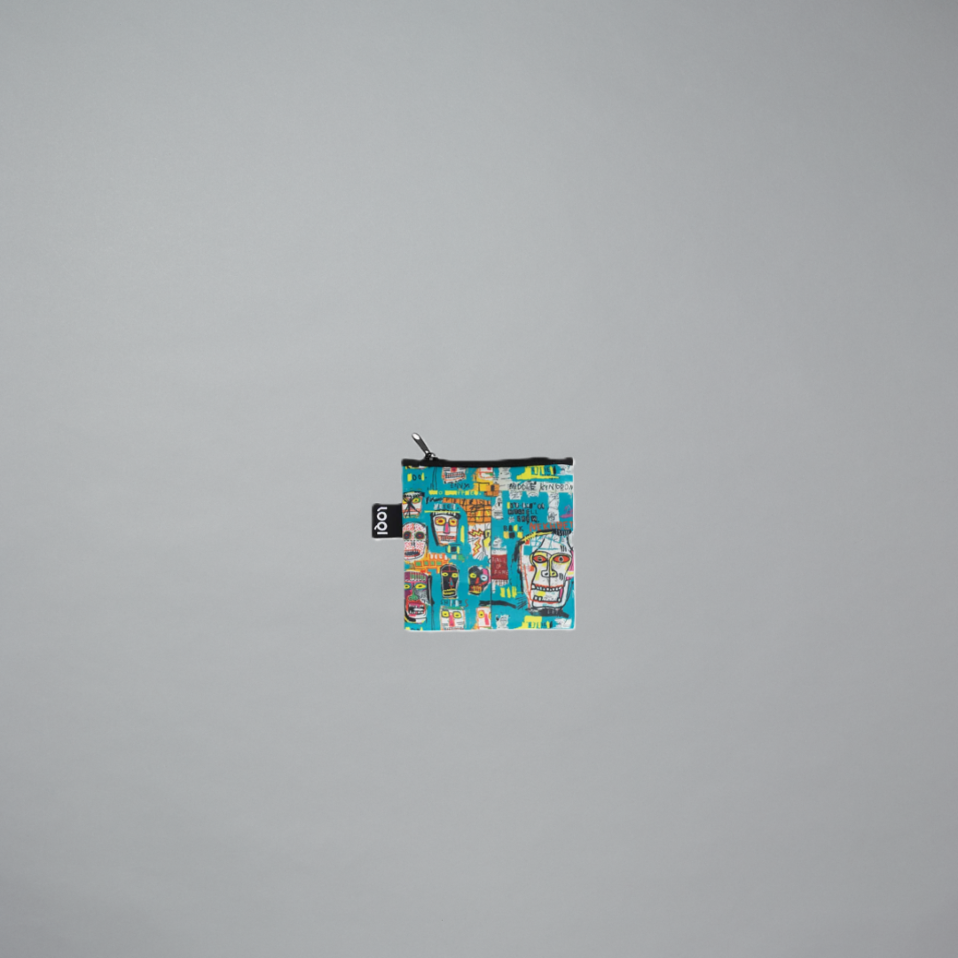A turquoise pouch with an all-over graffiti-style multicolor print by Jean-Michel Basquiat on a gray background