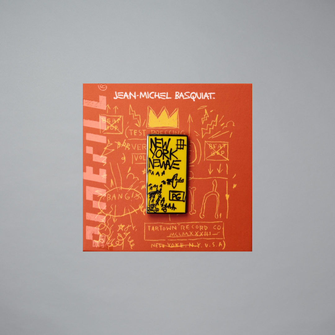 Jean-Michel Basquiat card with a yellow and black pin on a gray background