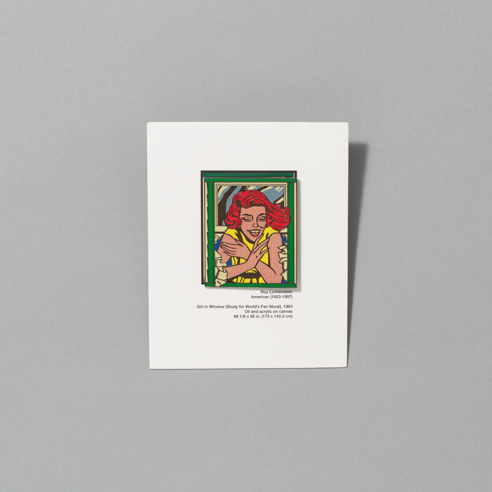 Enamel pin featuring Girl in Window by Roy Lichtenstein on white cardboard packaging on a gray background
