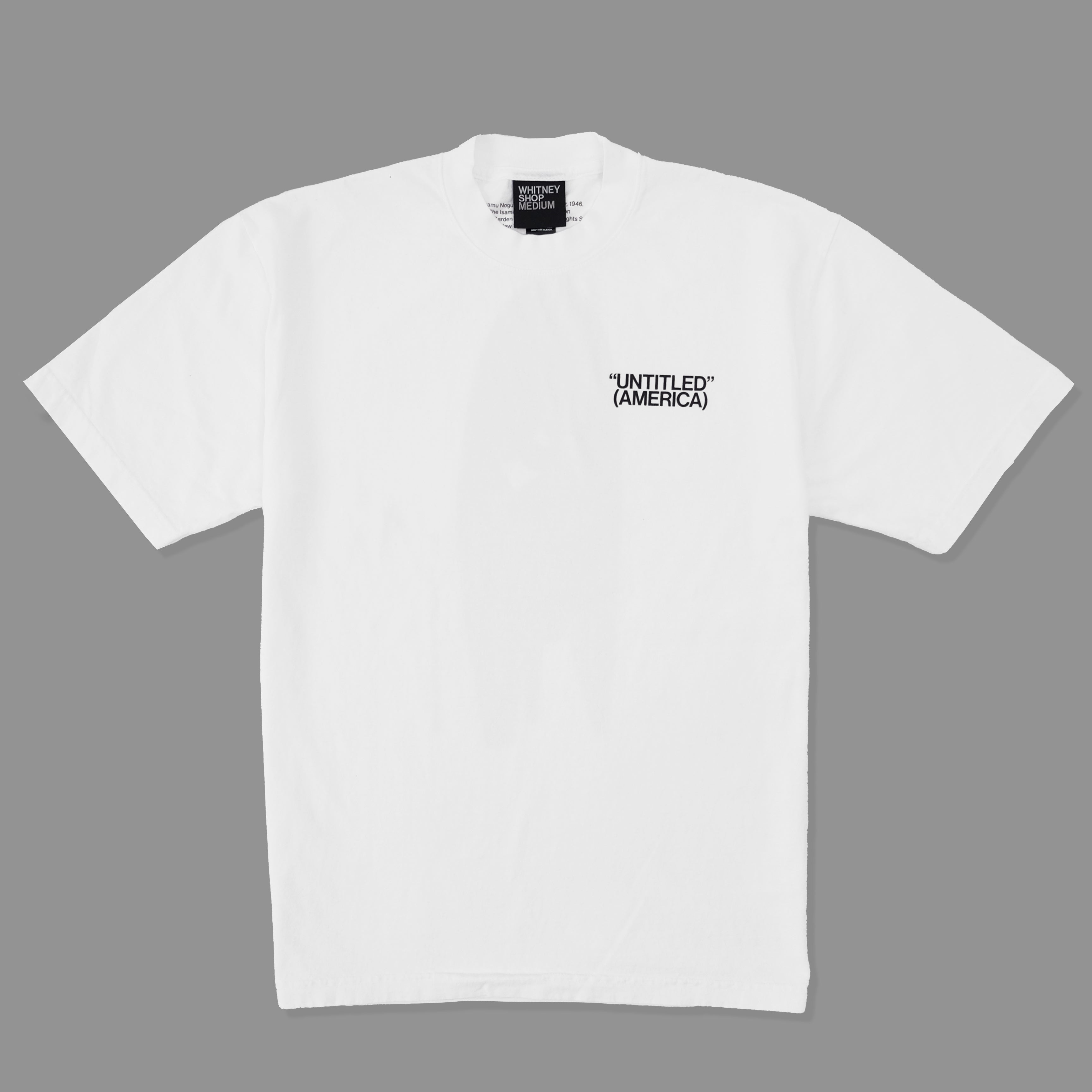 White t-shirt with 'UNTITLED (AMERICA)' text on a gray background