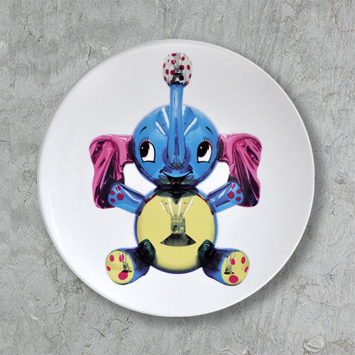 100% Porcelain plate featuring Jeff Koons Elephant. Measures 10.2" diameter.