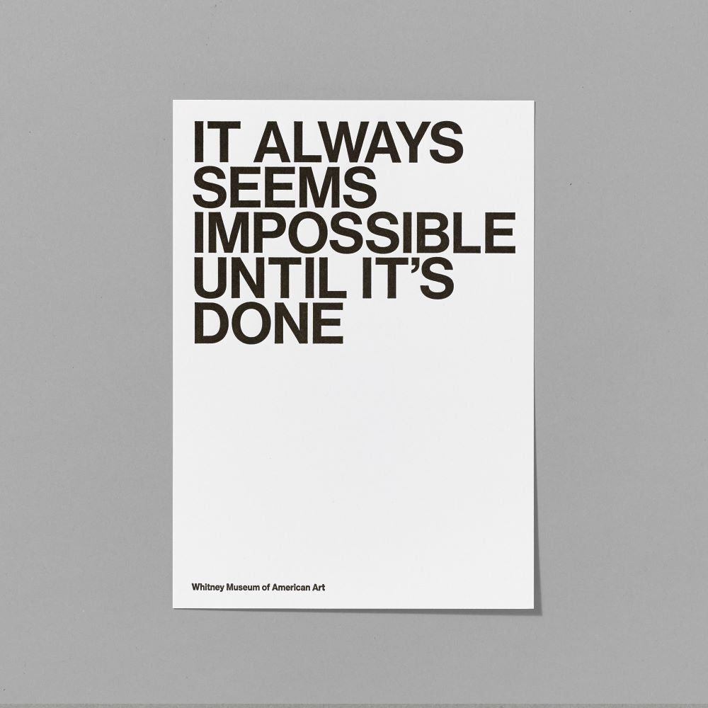 5" x 7" white letter pressed card with black text that reads "It Always Seems Impossible Until It's Done"