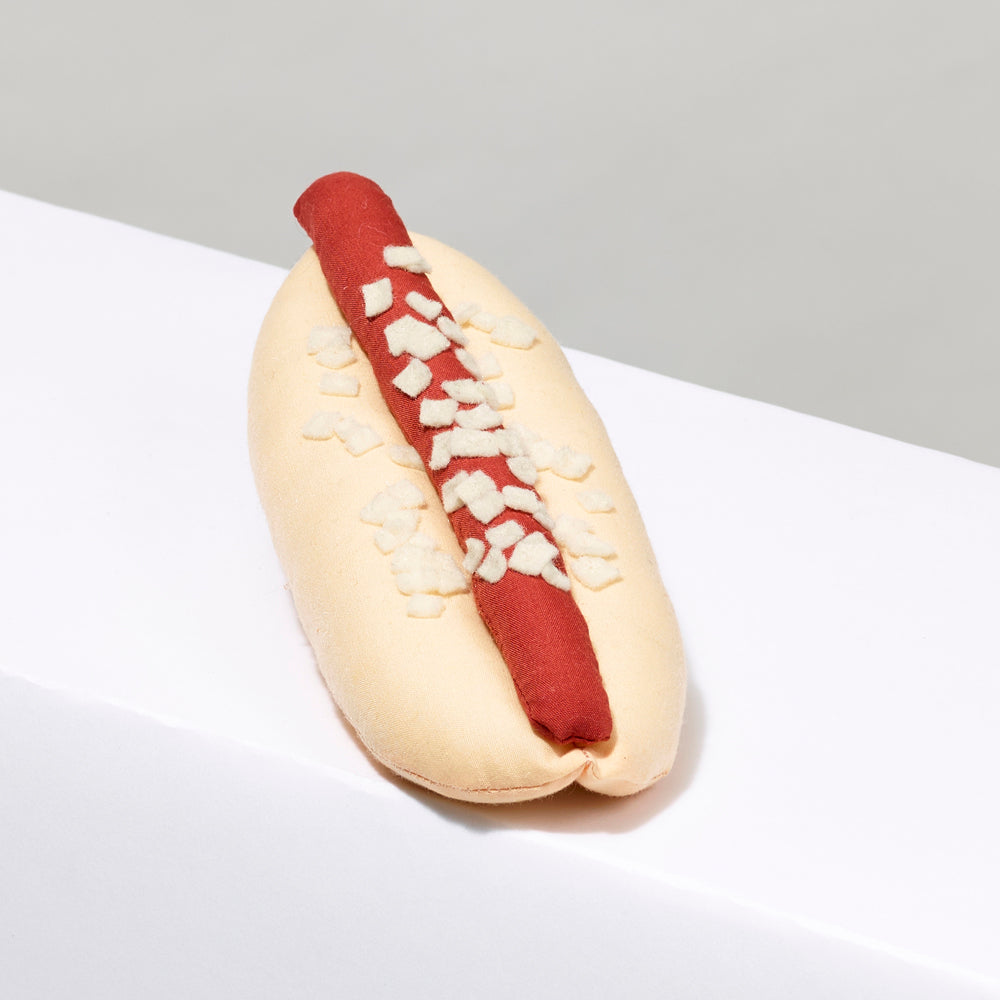 6" long stuffed hot dog with onion made of Cotton crepe, cotton thread, felt topping, polyester stuffing.