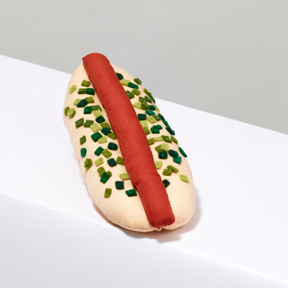 6" long stuffed hot dog with relish made of Cotton crepe, cotton thread, felt topping, polyester stuffing.