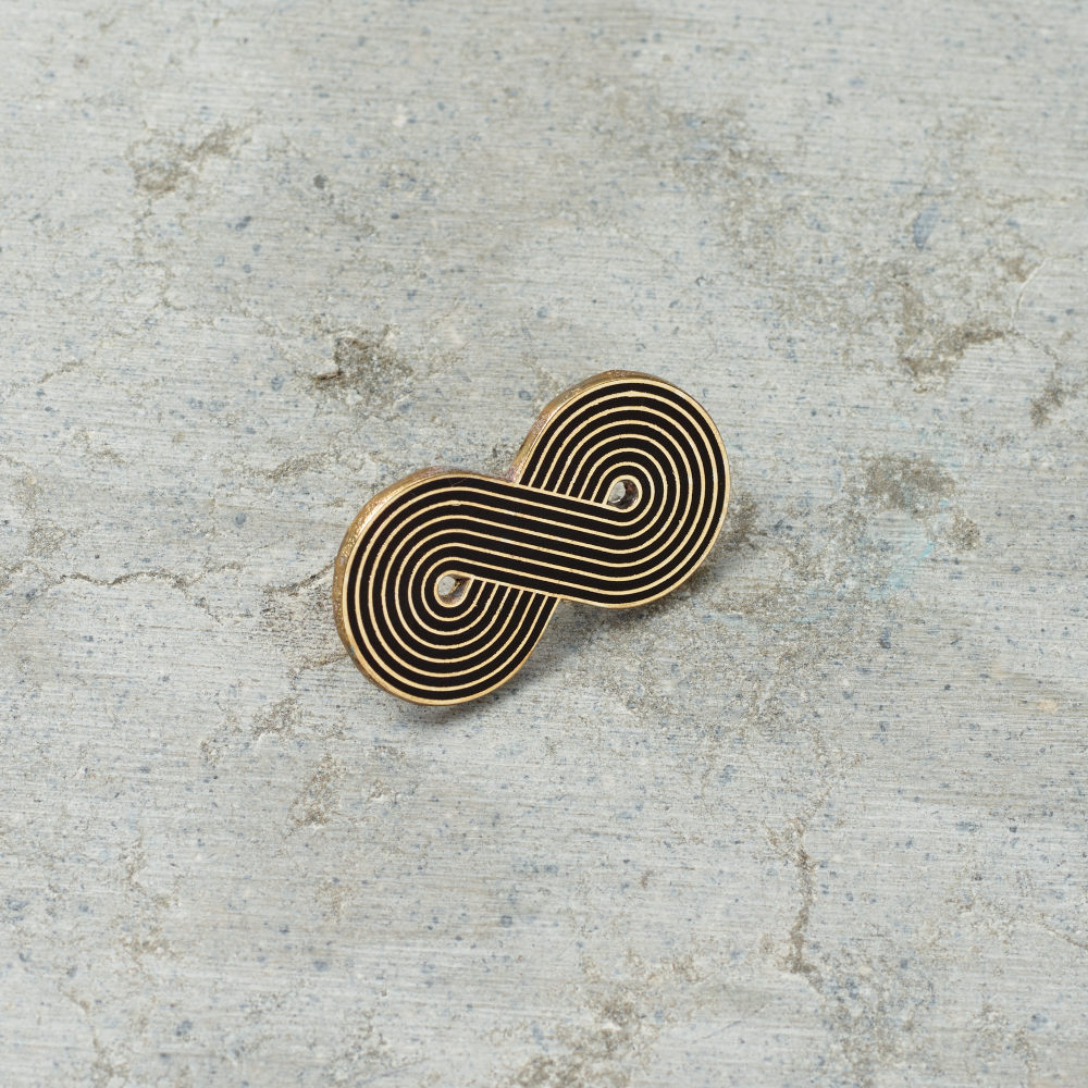 1.25" Hard enamel "Forever Gay" pin in black and gold