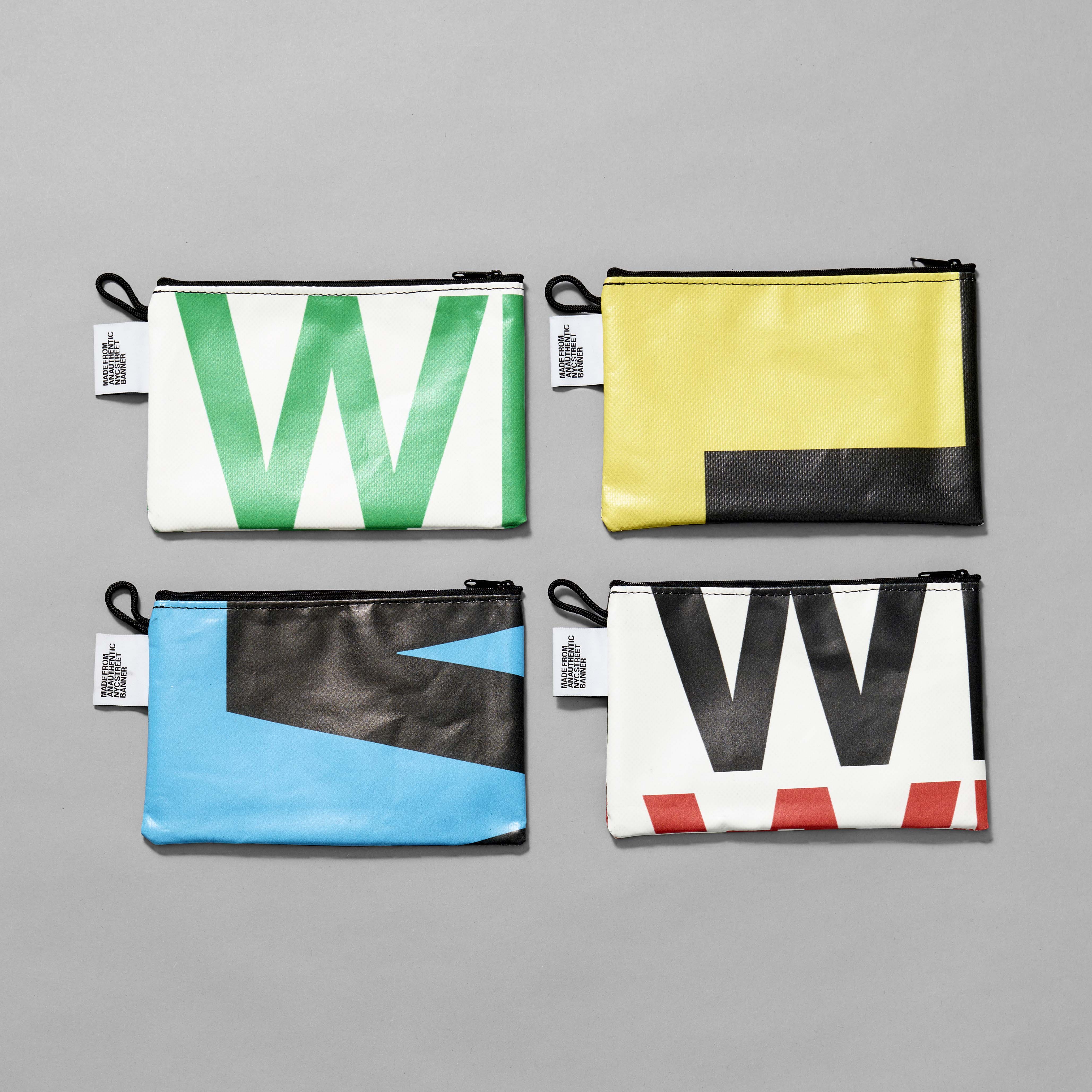 An assortment of recycled Whitney street banner pouches. Each measures 8" x 5"