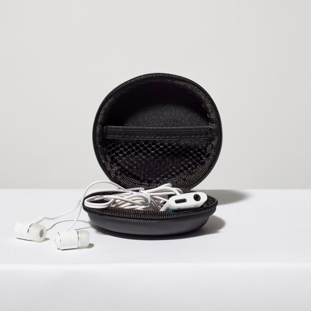 Whitney universal earphones and jack adapter case opened with earphones, wire, and jack adapter visible